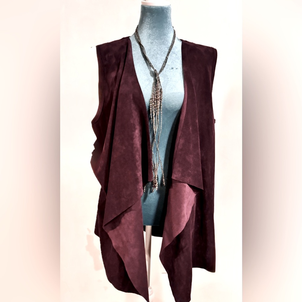 Calvin Klein Vest in size SM but is more of a one size fits most.
